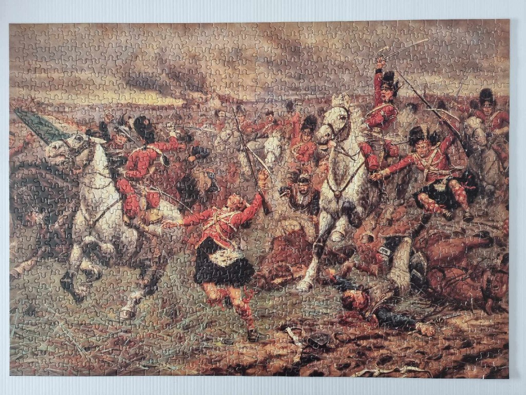 A dramatic historical painting of British soldiers in red coats engaged in a chaotic horseback battle.