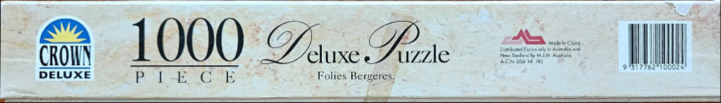 The side panel of a 1000-piece jigsaw puzzle box showing text details, a logo, and a barcode.