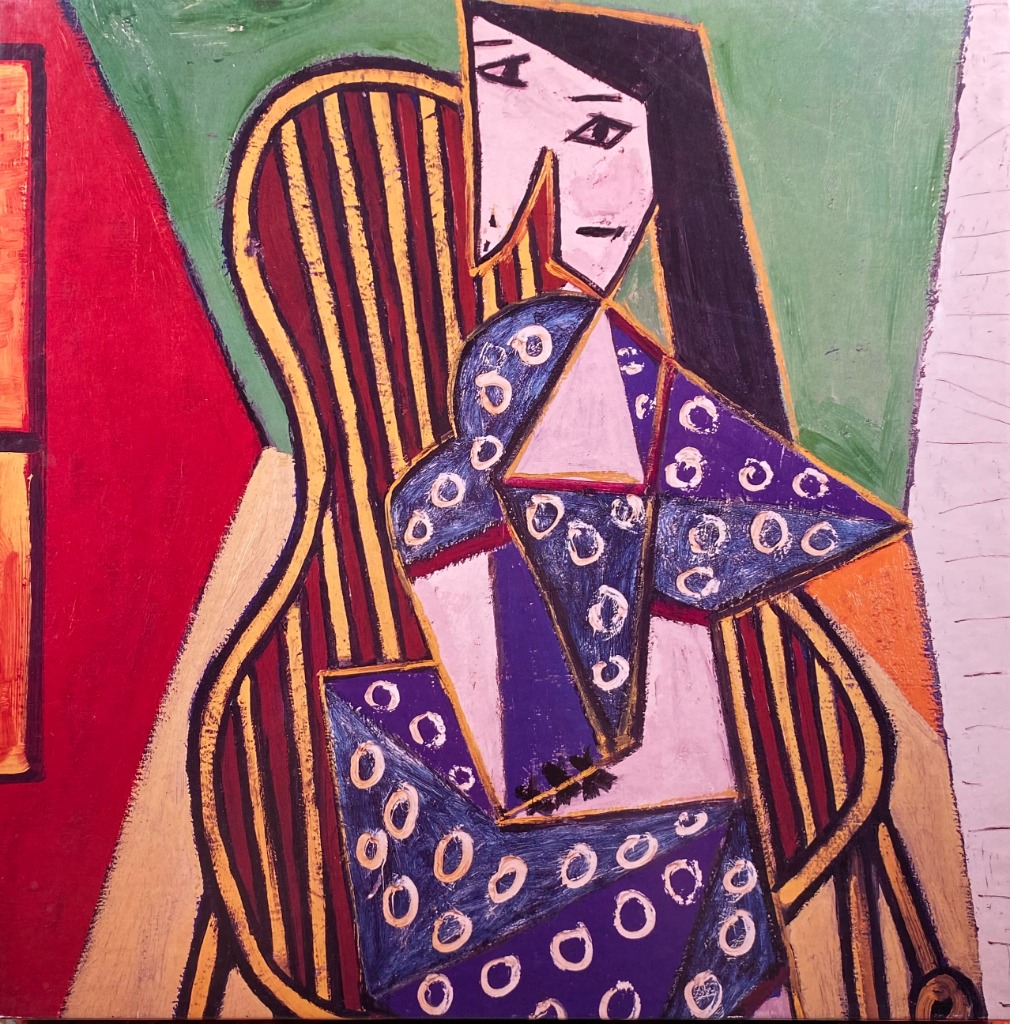 Cubist-style painting of a woman with dark hair sitting in a striped chair against a geometric, multi-colored background.