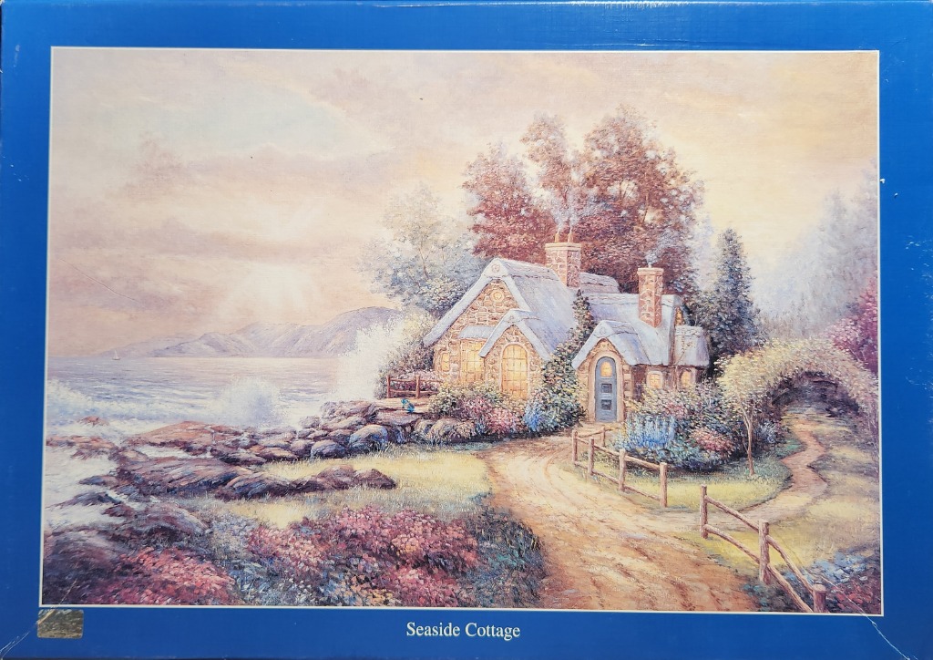 A stone cottage by the sea at sunset, surrounded by flowers and a dirt path.