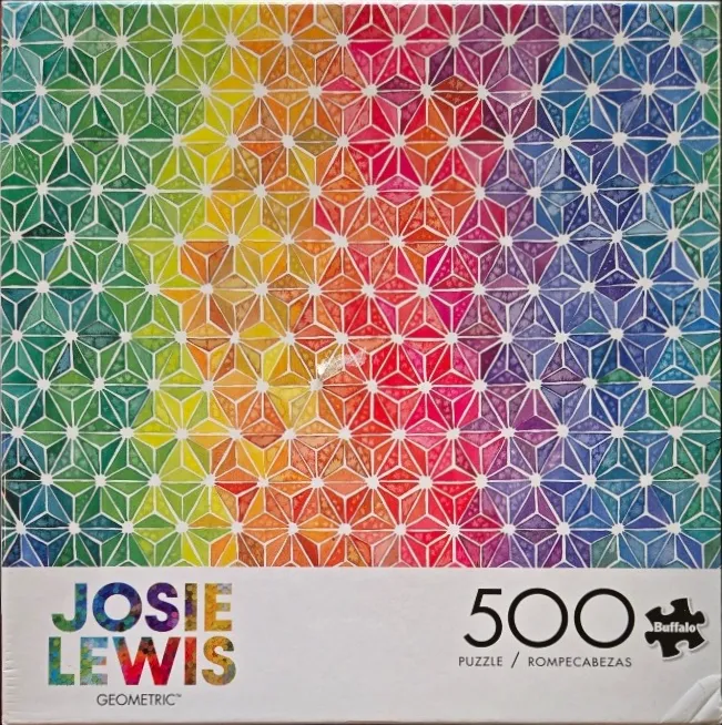 A vibrant geometric pattern composed of interlocking triangles in a watercolor rainbow gradient.