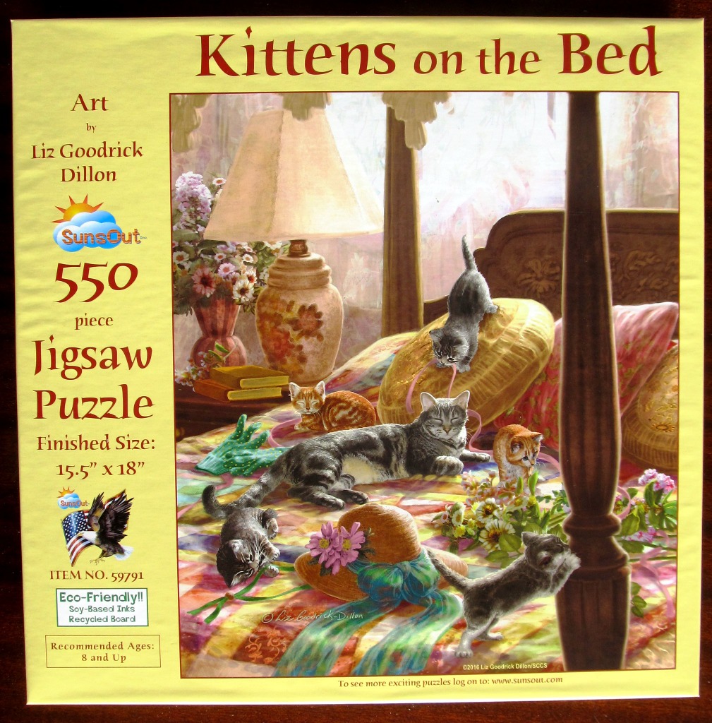 Oil painting of six kittens playing on a four-poster bed with a bedside lamp and flowers in a cozy bedroom setting.