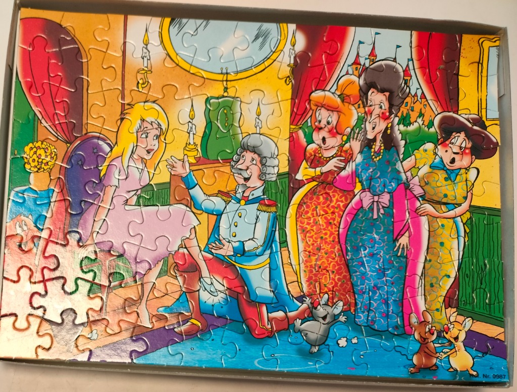 A cartoon illustration of a prince kneeling to place a glass slipper on a young woman