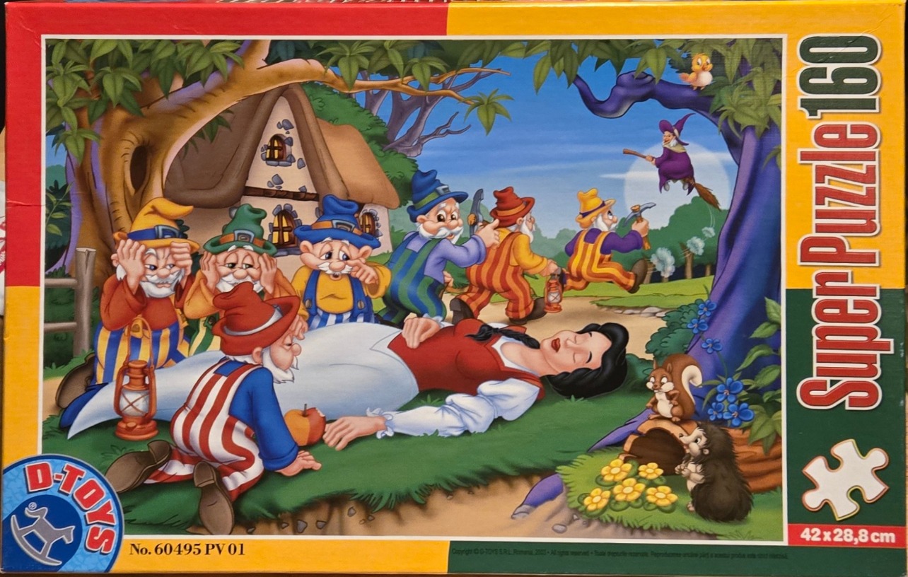 Seven dwarves mourning a sleeping princess lying in a meadow near a cottage.