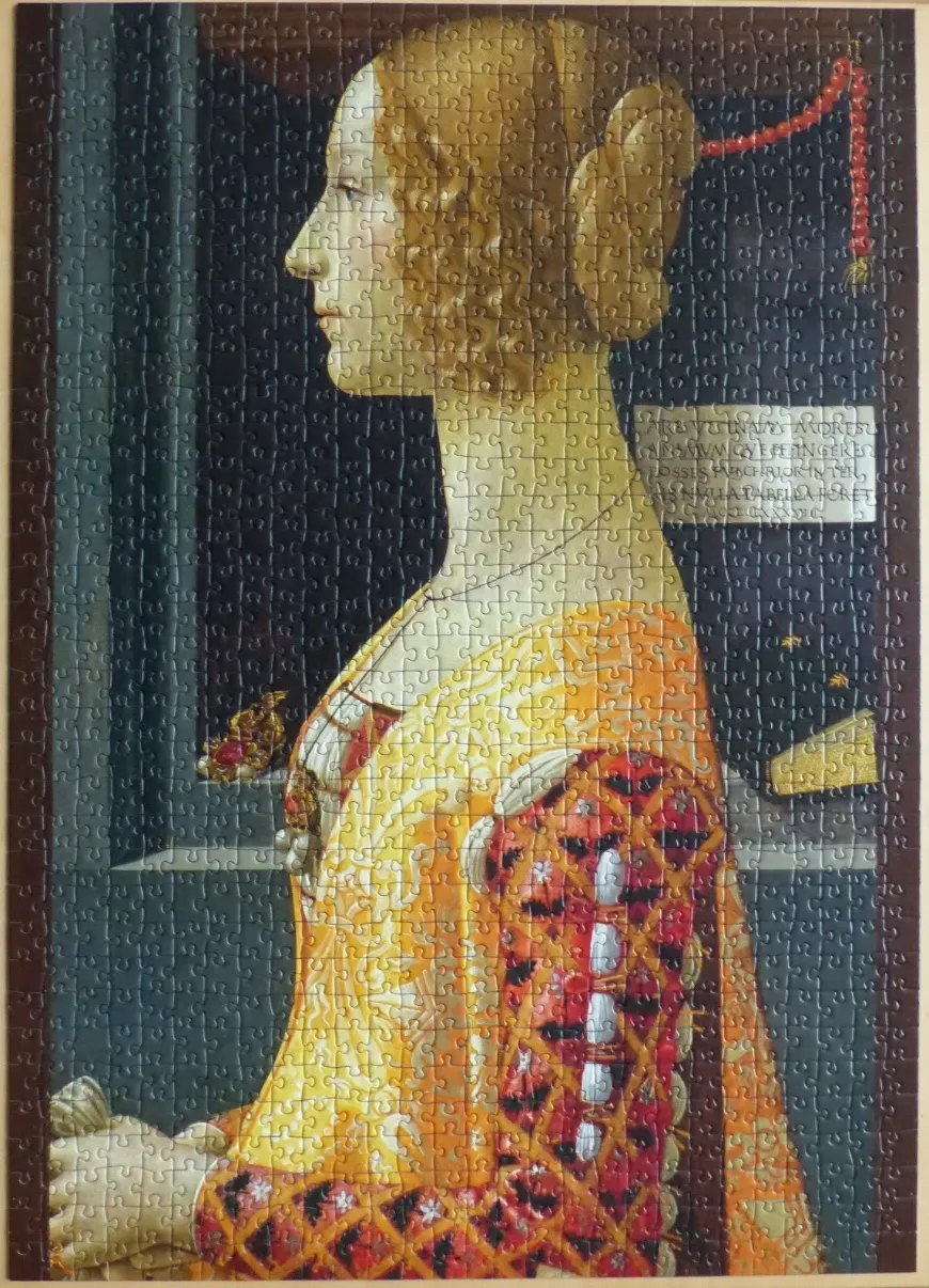 Renaissance-style portrait of a woman in profile wearing a patterned yellow and red dress.