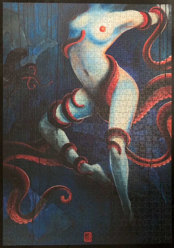 A surreal illustration of a pale, blue-skinned figure wrapped in red octopus tentacles against a dark background.