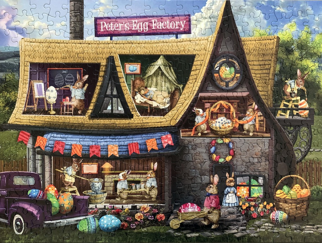A cutaway illustration of a rabbit-run egg factory in a cottage, with bunnies painting and packing decorated eggs.