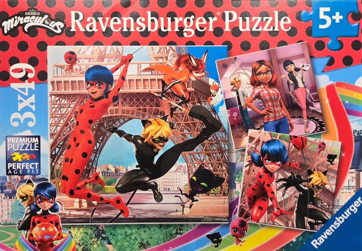 Animated characters Ladybug, Cat Noir, and Rena Rouge posing in front of the Eiffel Tower.