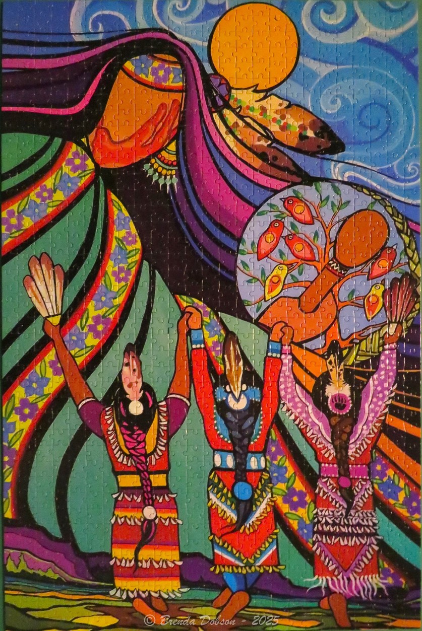 Stylized illustration of three Indigenous women holding hands under a celestial mother figure with birds and a drum.