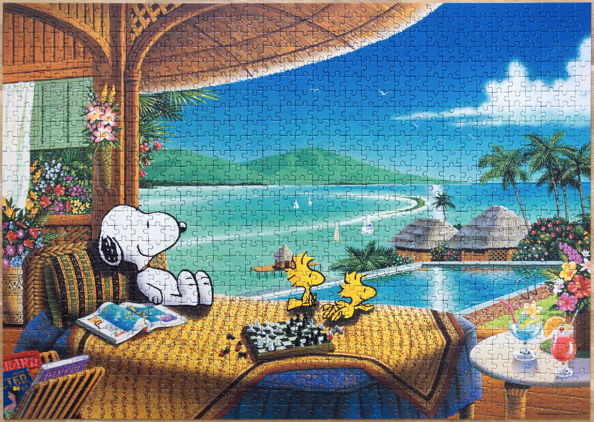 Snoopy and Woodstock playing chess on a tropical patio overlooking a sunny beach