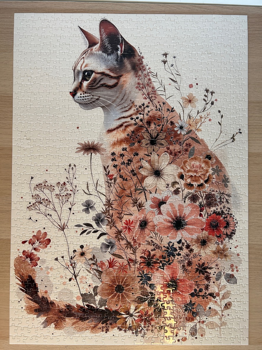 A profile view of a tabby cat surrounded by delicate, earthy-toned botanical illustrations of flowers and stems.