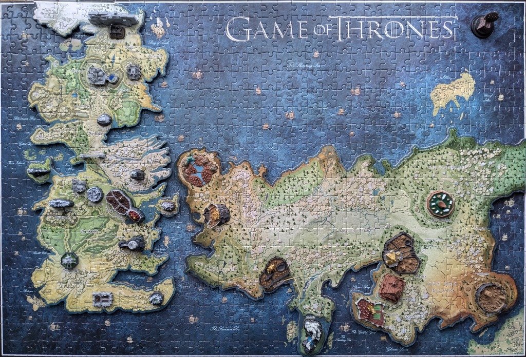 A fantasy map of Westeros and Essos with three-dimensional landmarks placed on top of the illustrated continents.