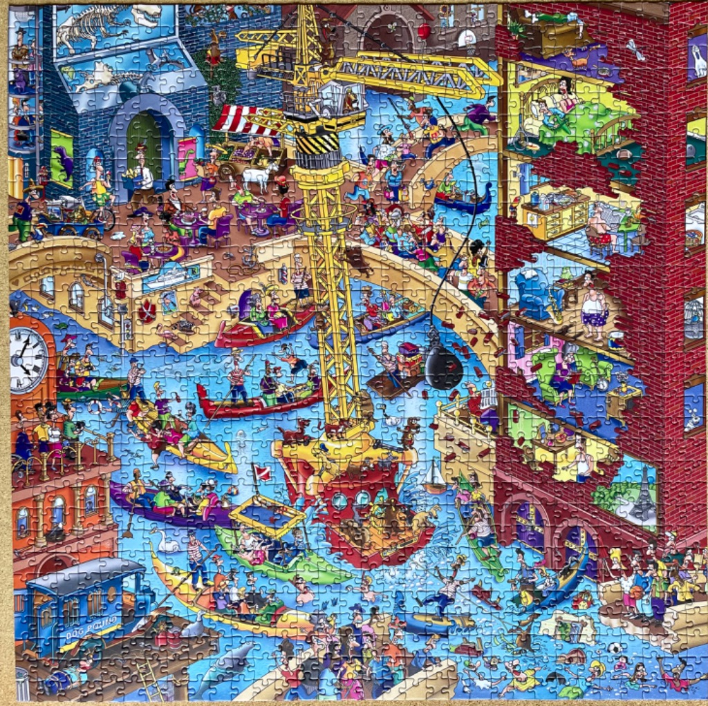 A chaotic, busy cartoon illustration of a flooded city canal scene with a large yellow construction crane.