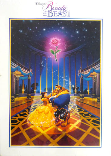 Belle and the Beast dancing in a ballroom under an enchanted floating rose