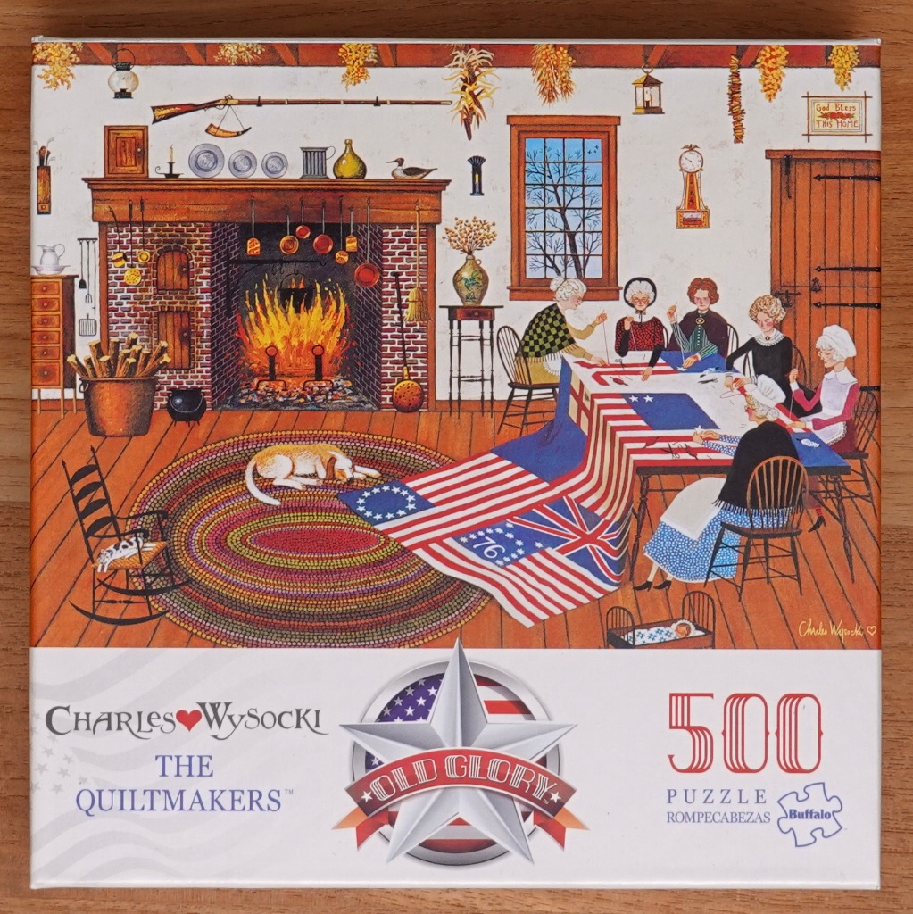 A folk art illustration of women sewing a large American flag in a cozy rustic room with a fireplace.