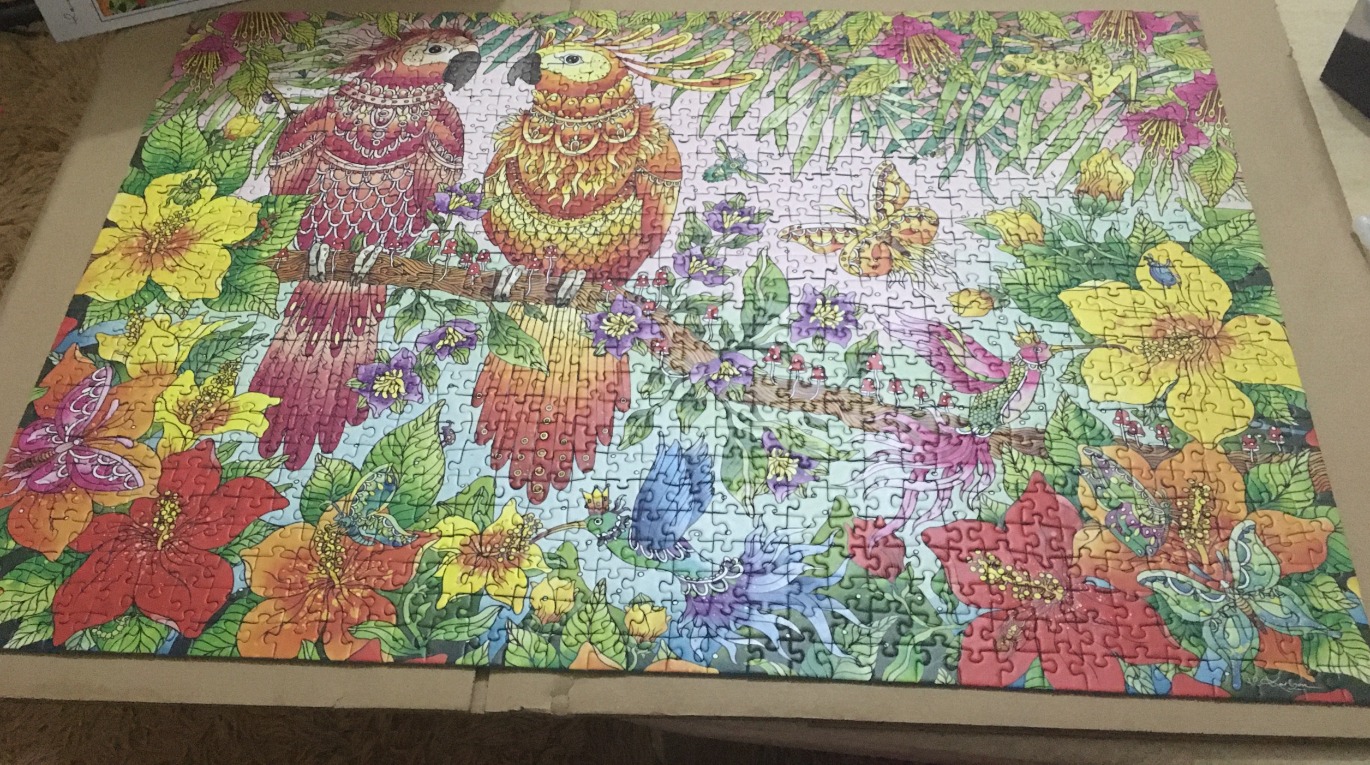 Intricate illustration of two parrots perched among vibrant tropical flowers and butterflies