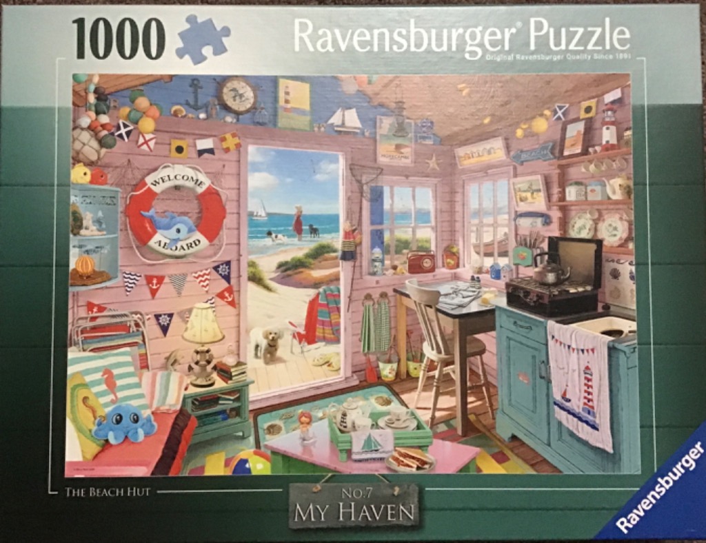 A cozy, illustrated beach hut interior opening onto a sunny coastal view with a dog and person on the sand.