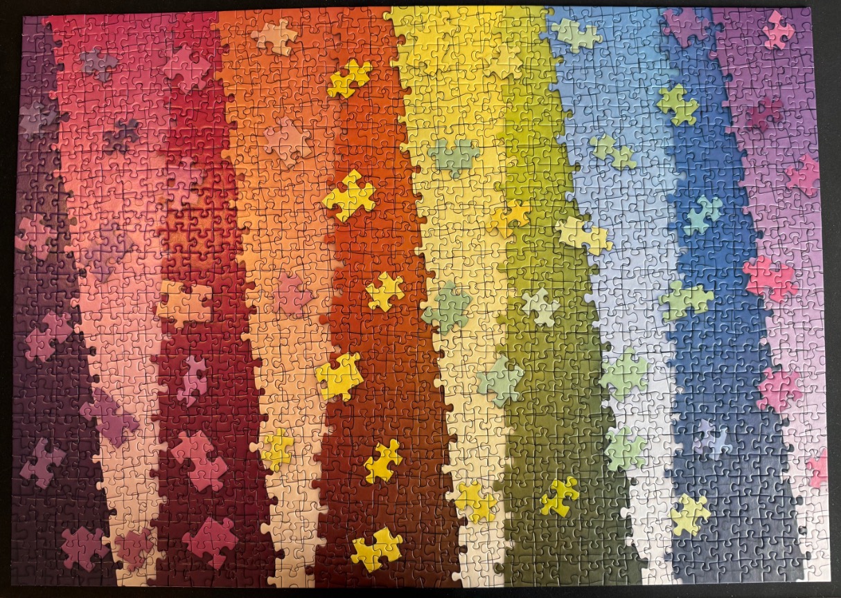 A vibrant rainbow spectrum divided into vertical bands of shifting colours.
