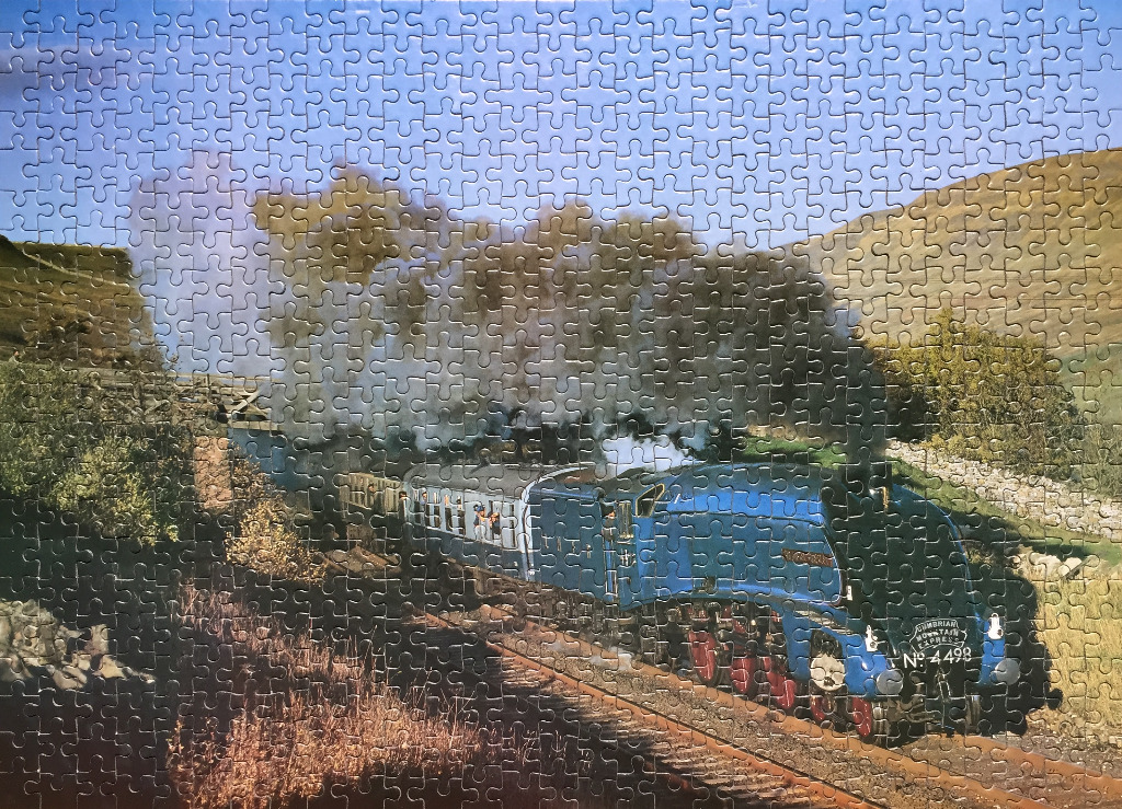 A blue steam locomotive traveling through a hilly landscape with a stone bridge and thick smoke.