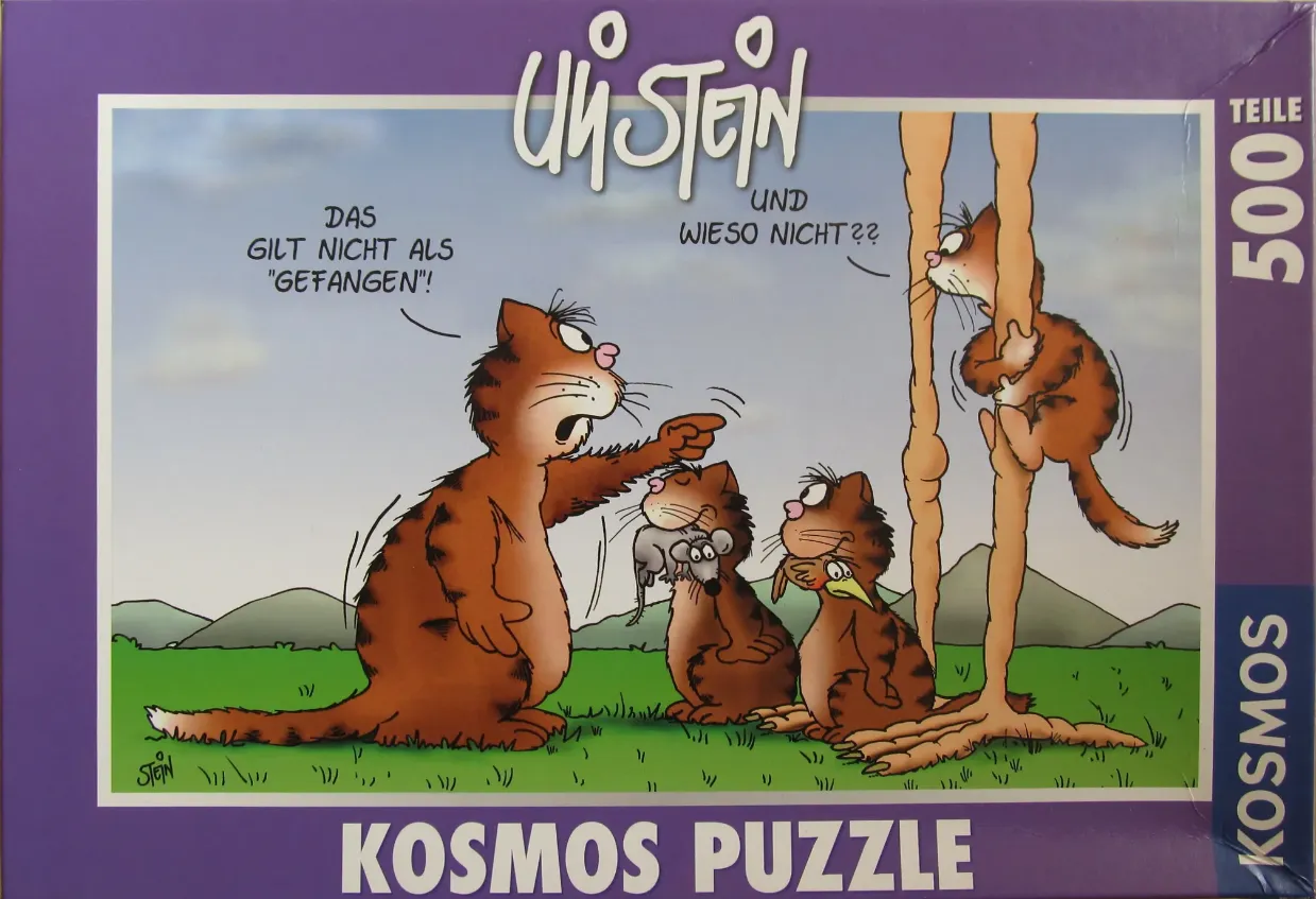 Cartoon scene of four brown tabby cats interacting in a grassy field with a speech bubble about catching prey.
