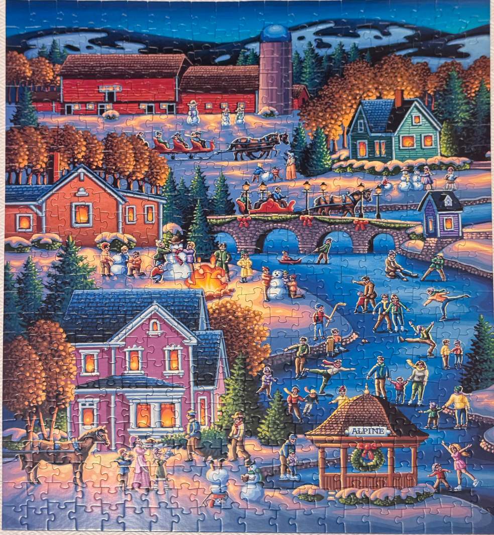 A festive winter village scene with people ice skating on a frozen pond by a stone bridge and colorful houses.