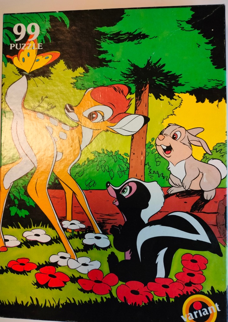 Cartoon illustration of a young deer, rabbit, and skunk in a colorful forest meadow.