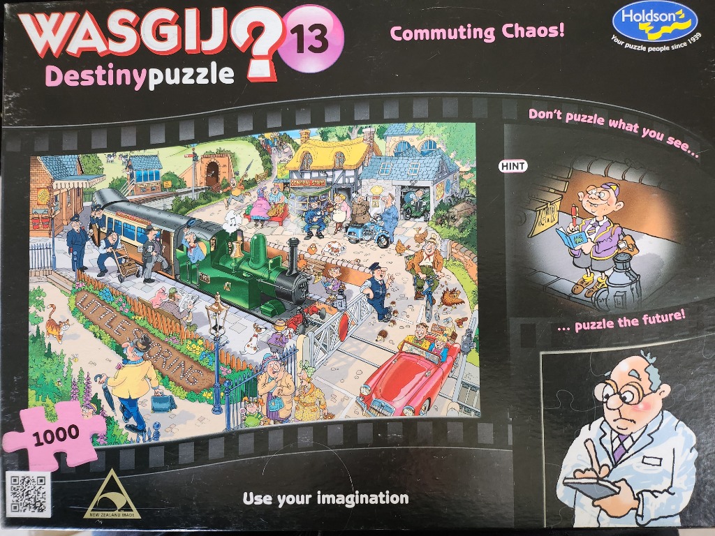 Cartoon illustration of a busy, chaotic train station scene in a quaint English village.