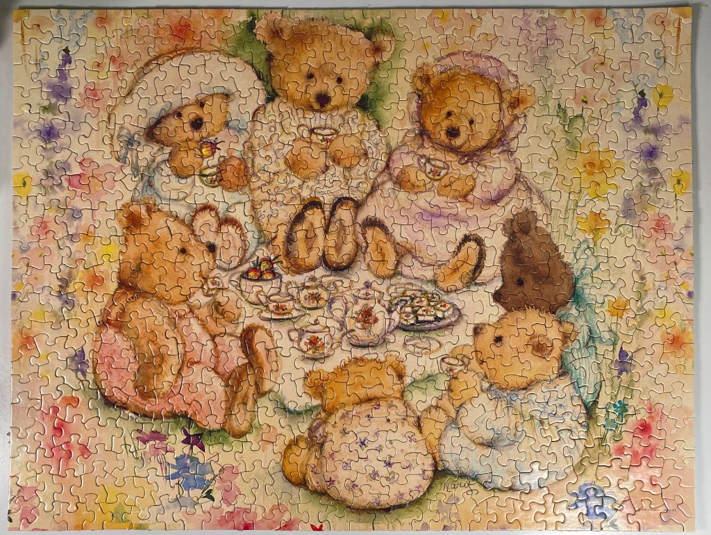 An illustration of six teddy bears having a tea party in a garden.