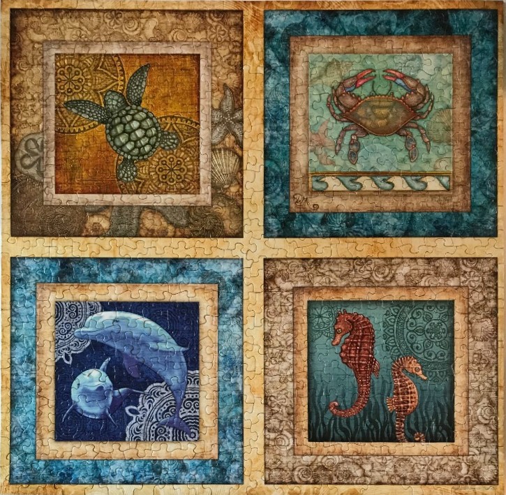A four-quadrant illustration featuring a sea turtle, crab, dolphins, and seahorses in decorative borders.