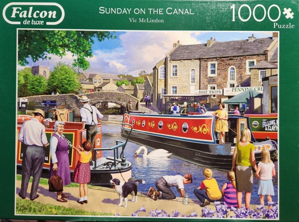 A peaceful canal scene featuring traditional narrowboats, people, and a stone bridge on a sunny day.