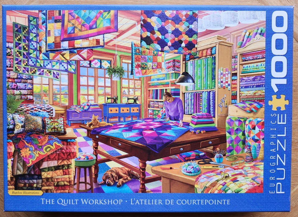 A cozy, vibrant quilt workshop featuring a woman working on a blue and purple quilt at a central wooden table.