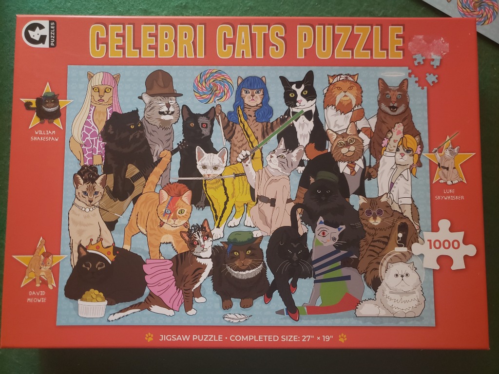 An illustration of many cats dressed as famous celebrities and pop culture icons.