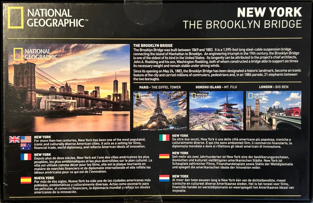 The Brooklyn Bridge at sunset with city skyscrapers in the background