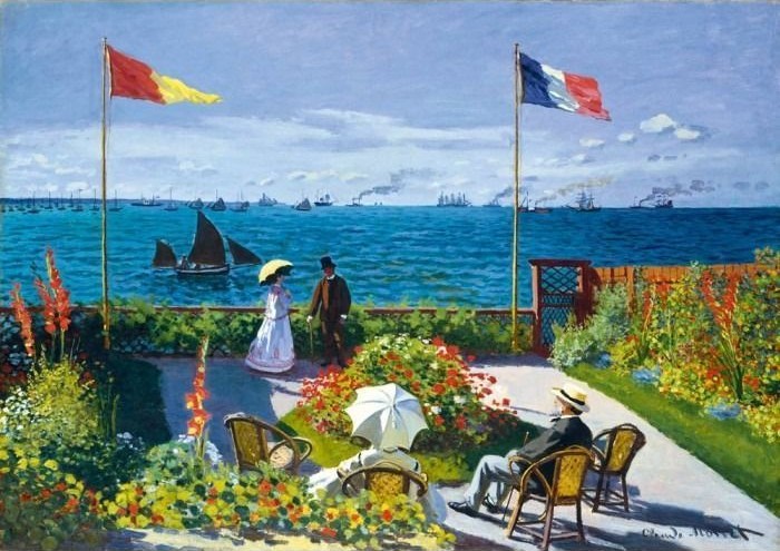A sunny seaside garden terrace with four people, flower beds, and two flags overlooking a blue ocean with ships.