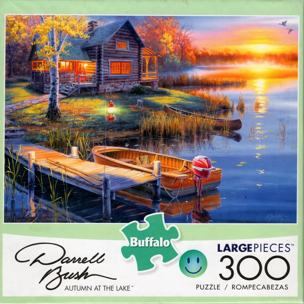 A cozy log cabin at sunset by a lake with a wooden dock and a small motorboat.