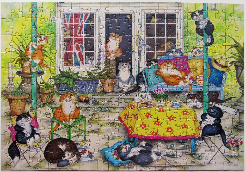 A whimsical illustration of many cats playing and relaxing in a sunlit garden setting with a patio and table.