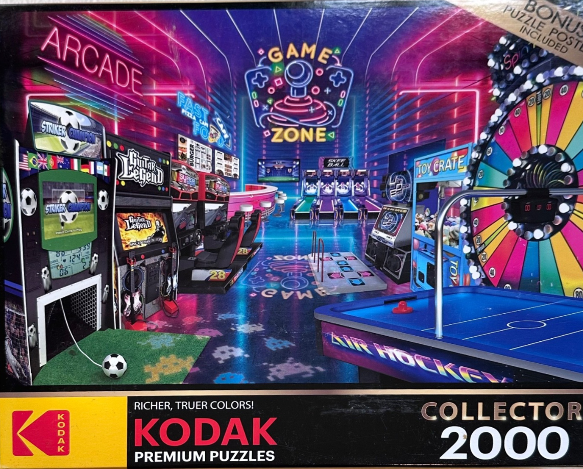 Neon-lit indoor arcade with various games, including air hockey, a spinning prize wheel, and football machines.