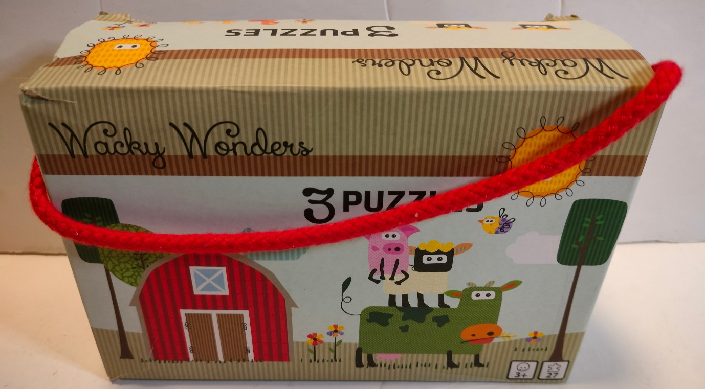 Illustration of farm animals stacked on a cow with a red barn in a cartoon style