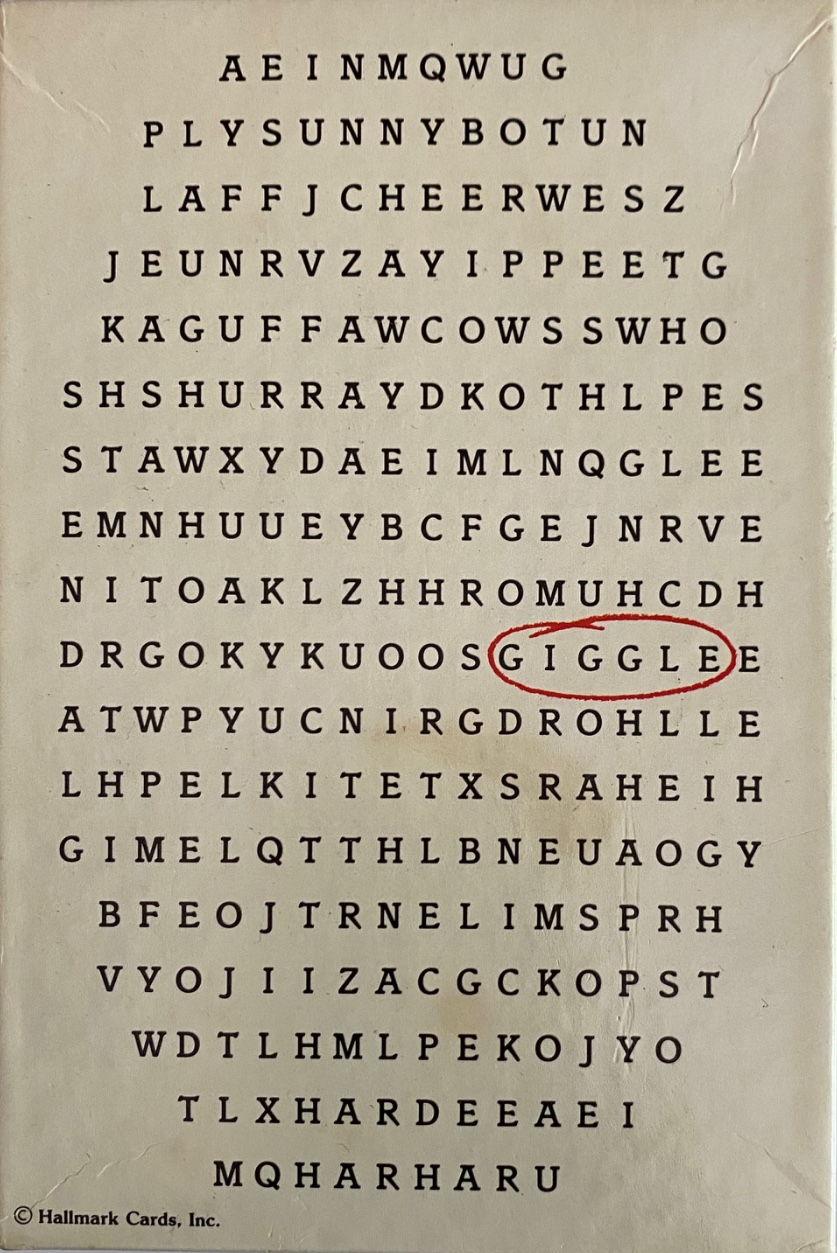 A word search grid on a cream background with the word GIGGLE circled in red.
