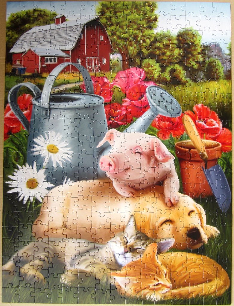 A piglet, golden retriever puppy, and ginger kitten napping together in a garden in front of a red barn.