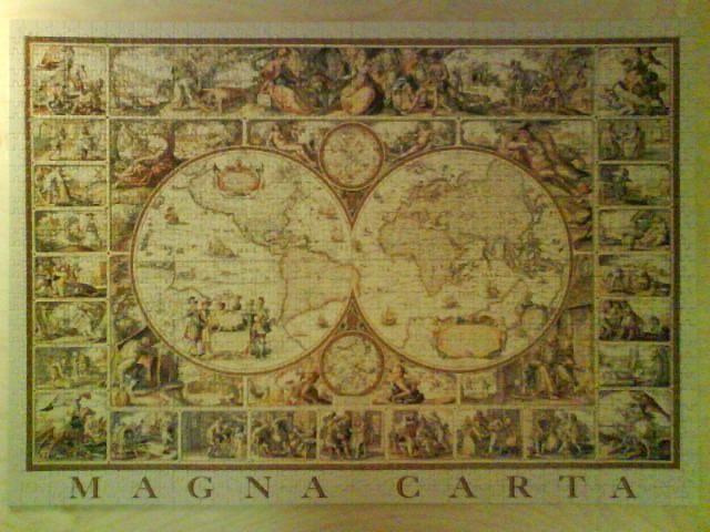 A vintage-style double-hemisphere world map surrounded by decorative vignettes and the text MAGNA CARTA.