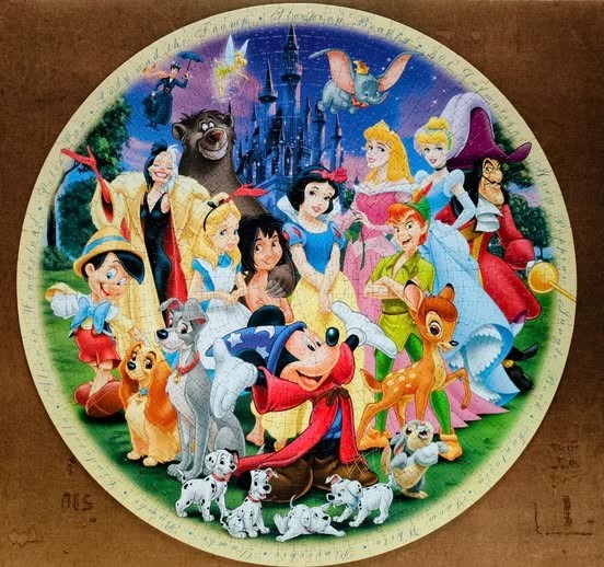 A circular illustration featuring an ensemble of classic animated characters in front of a castle.