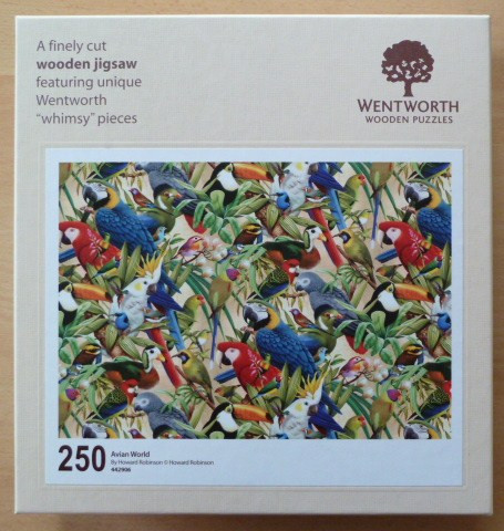 A dense pattern of colorful tropical parrots, toucans, and cockatoos nestled among green jungle foliage.