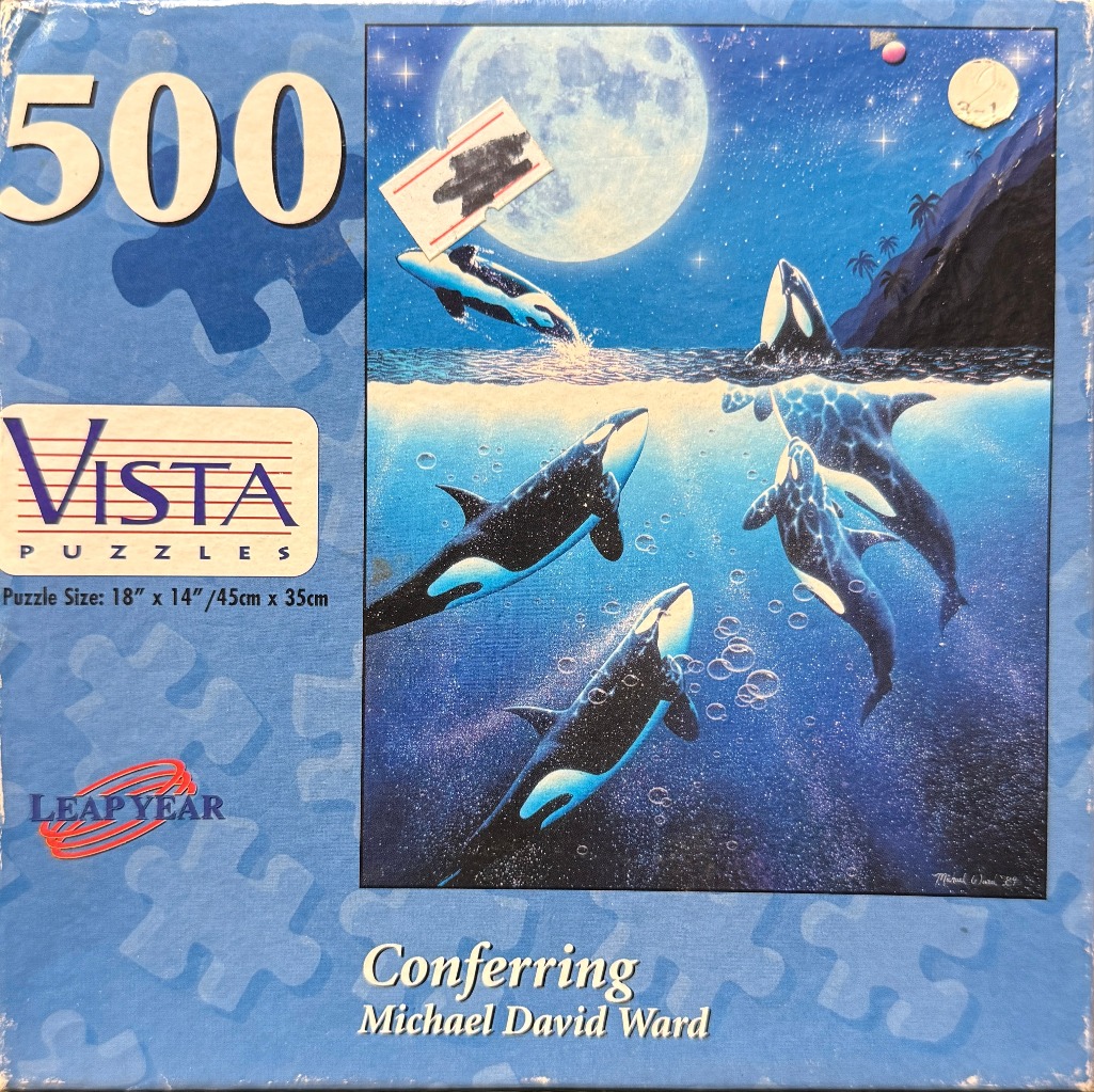 A group of orcas swimming in the ocean under a night sky with a large, bright full moon.