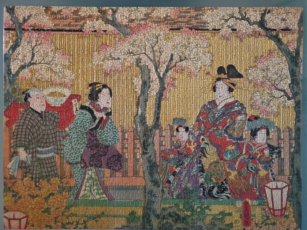 A traditional ukiyo-e style woodblock print depicting a group of people in Japanese historical dress under cherry trees.