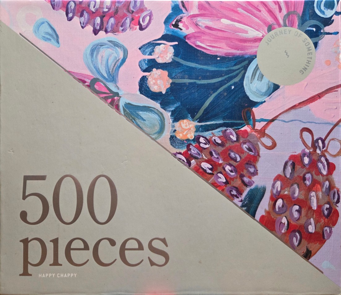 Abstract acrylic painting with pink background, dark blue floral shapes, and red dotted berry-like clusters.