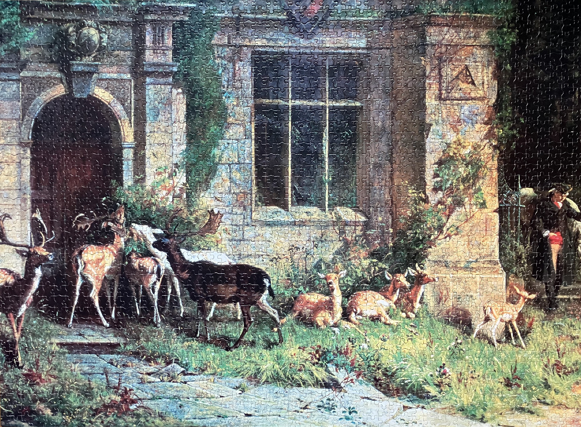 A pastoral scene of a herd of deer outside an old stone building with a man standing to the right.