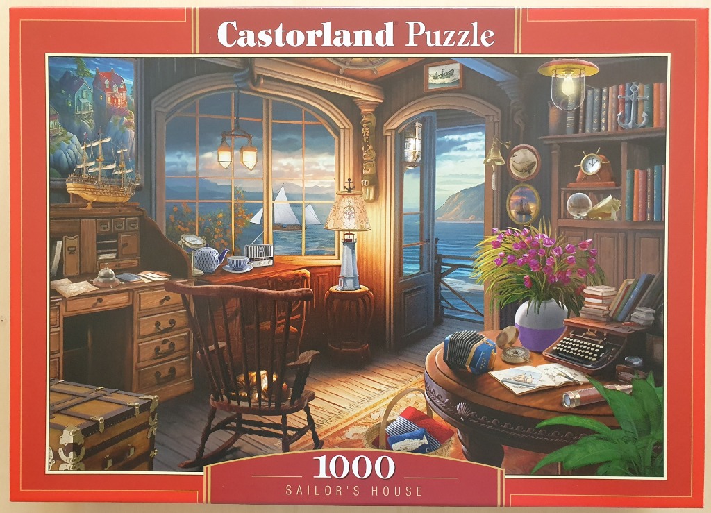 Cozy, cluttered sailor's study overlooking the sea at sunset