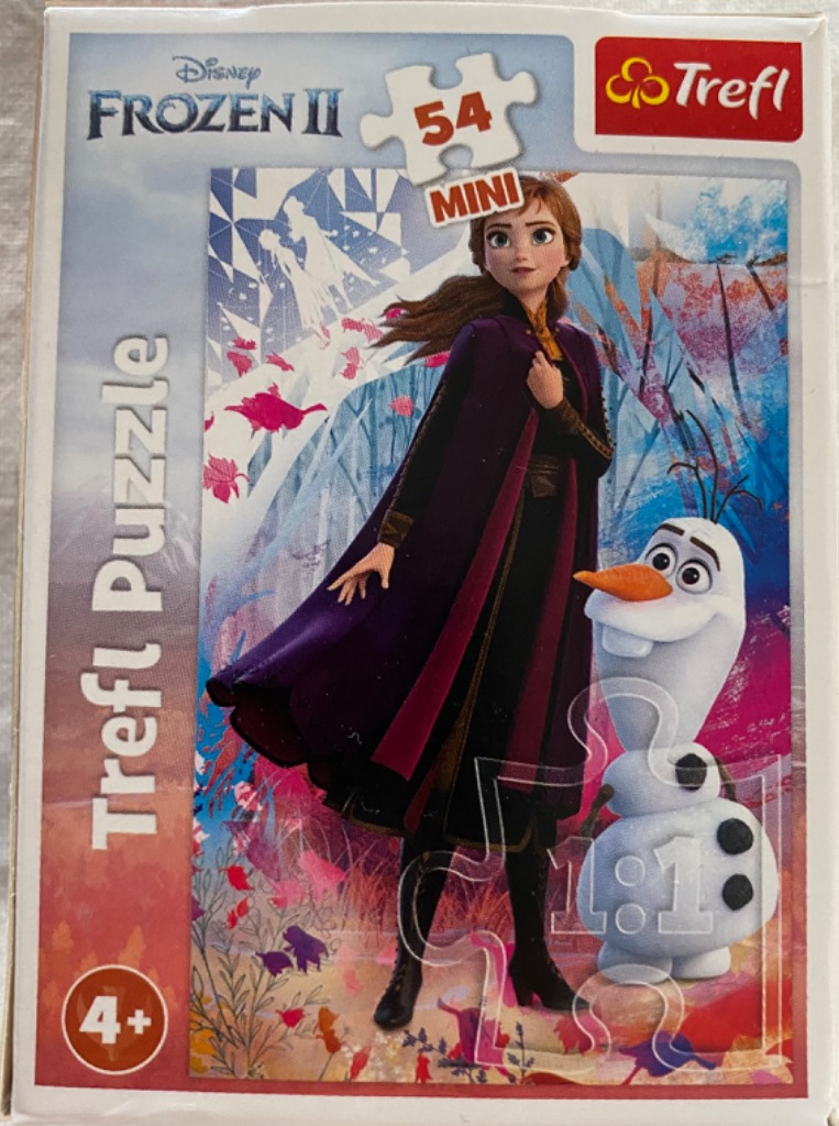 Anna and Olaf standing in an autumnal forest scene