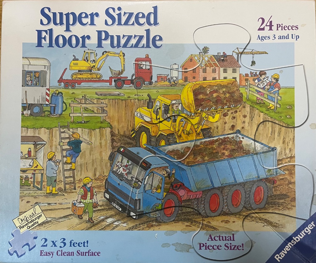 Cartoon construction site with workers, yellow heavy machinery, and a blue dump truck.